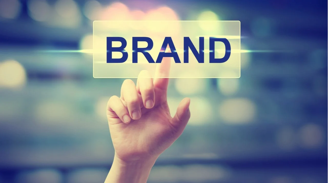 "Brand" text, and a finger touching it